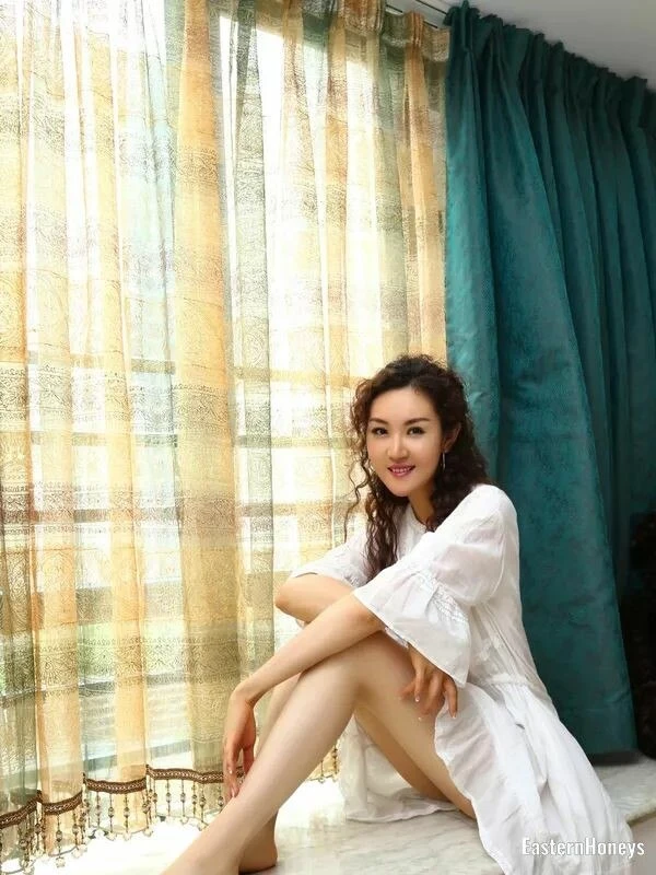 Carla Wang, 32